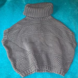 Girls throw over turtleneck sweater